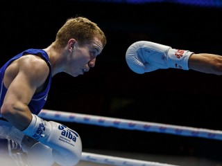 Евгений Кармильчик выиграл бронзовую медаль чемпионата мира по боксу в весовой категории до 48 кг